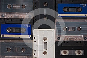 Old cassette tapes with a wooden background photo