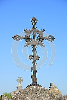 Old cast iron cross ornament