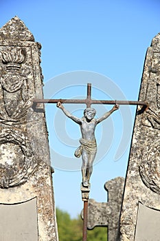 Old cast iron cross ornament