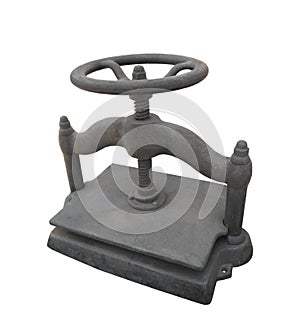Old cast iron wheel turned book press isolated.