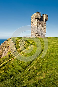 Old castle on Cliffs of Moher in Ireland.