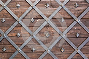 Old castle door texture with faded wood and metal