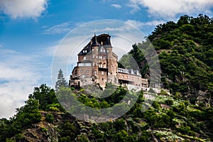 An old castle in the hillside on the Rhine