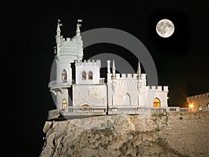 Old castle and Moon photo