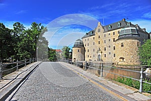 Old castle and pavement bridge in Orebro