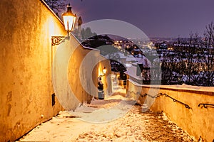 Old Castle Stairs at night, Prague, Czech Republic.Beautiful spectacular winter panorama of Vltava river and historical buildings.