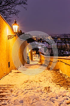 Old Castle Stairs at night, Prague, Czech Republic.Beautiful spectacular winter panorama of Vltava river and historical buildings.