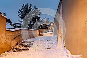 Old Castle Stairs at night, Prague, Czech Republic.Beautiful spectacular winter panorama of Vltava river and historical buildings.