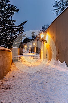 Old Castle Stairs at night, Prague, Czech Republic.Beautiful spectacular winter panorama of Vltava river and historical buildings.