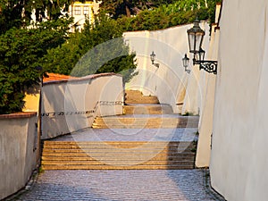 Old Castle Stairs on Prague Castle. Medieval stairway with vintage lamps, Prague, Czech Republic