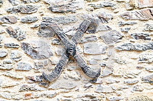 Old castle stone wall with the letter