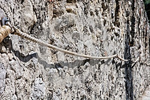 Old castle wall with auxiliary rope