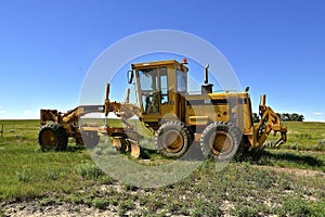 Old Caterpillar road grader