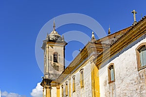 Old catholic bell church tower and facade of the 18th century