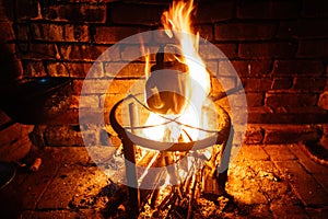 Old cattle heating on fire in the stove