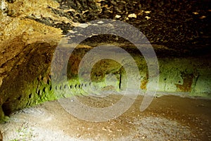 Old caves dug into the tuff rock and used for human habitation in ancient times. Citta del Tufo. Sorano, Sovana, Tuscany, Italy