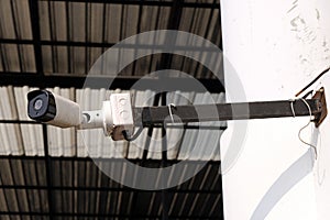 CCTV camera security on the purple wall , With place your text