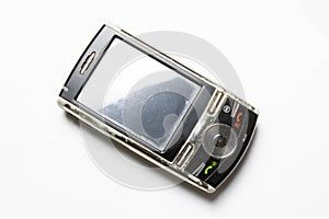 Old cell phone on white background