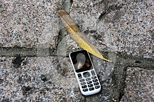 Old cellphone on the floor