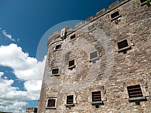 Old celtic castle tower walls, Cork City Gaol prison in Ireland. Fortress, citadel background