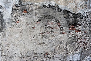 Old cement dry Wall Texture background image. Coat on top red brick