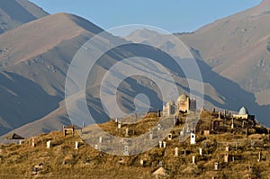 Old cemetery with clay gumbezes - traditional tombs,Osh region,Kyrgyzstan