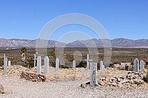 An old cemetery with graves covered with rocks know as boothill