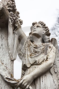 Old cemetery marble sculpture of the angel