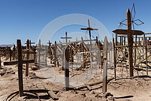 An old cemetery with wooden crosses near the abandoned towm of Pampa Union, in the Atacama Desert, Chile