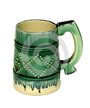 Old ceramic beer mug isolated on white