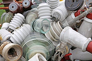 Old ceramic insulators in an old dump obsolete material