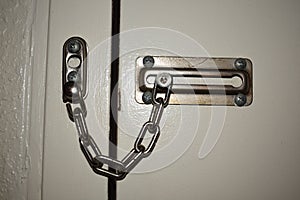 Old Chain Lock on Hotel Door