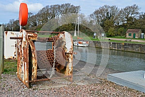 An Old Chain Winch In A Harbour