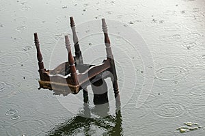 Old chair rubbish in the water