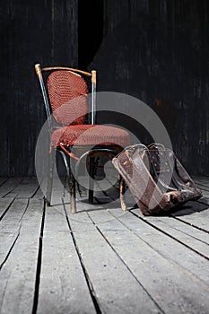 Old chair and suitcase