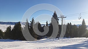 Old chairlift sunrise in the mountains