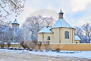 Old chapel and the bishop's castle. Winter landscape. photo