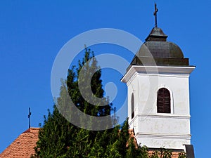 Old chapel detail with white stucco walls and black Zink plated roof