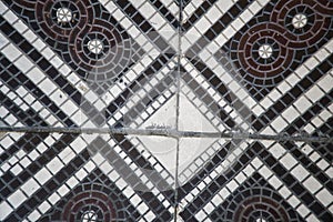 Old checkered floor. Decorative ornamental checkered marble floor