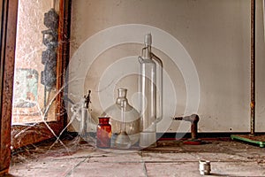 Old chemistry bottles and glass, urbex photo