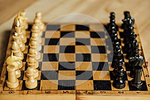 Old chess board set for a new game at home