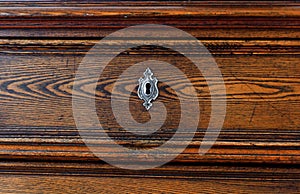 .old chest of drawers with handles and keyholes - Image