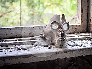 Old children`s gas mask inside of the abandoned Pripyat Elementary School No. 3 in Pripyat city, Chernobyl