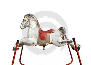 Old childâ€™s spring hobby horse isolated