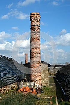 Old chimney and boilerhouse of an historical dutch horticultural