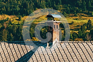 Old chimney on top of the typical slovenian mountain house