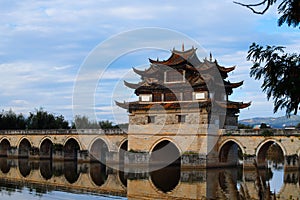 Old chinese bridge. The ancient Shuanglong Bridge Seventeen Span Bridge near Jianshui, Yunnan, China