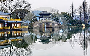 Old Chinese Bridge West Lake Reflection Hangzhou Zhejiang China photo