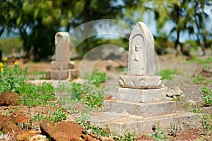 Old chinese grave headstones abandoned on Kauai