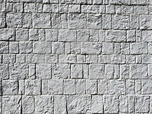 Old chipped white brick wall texture
